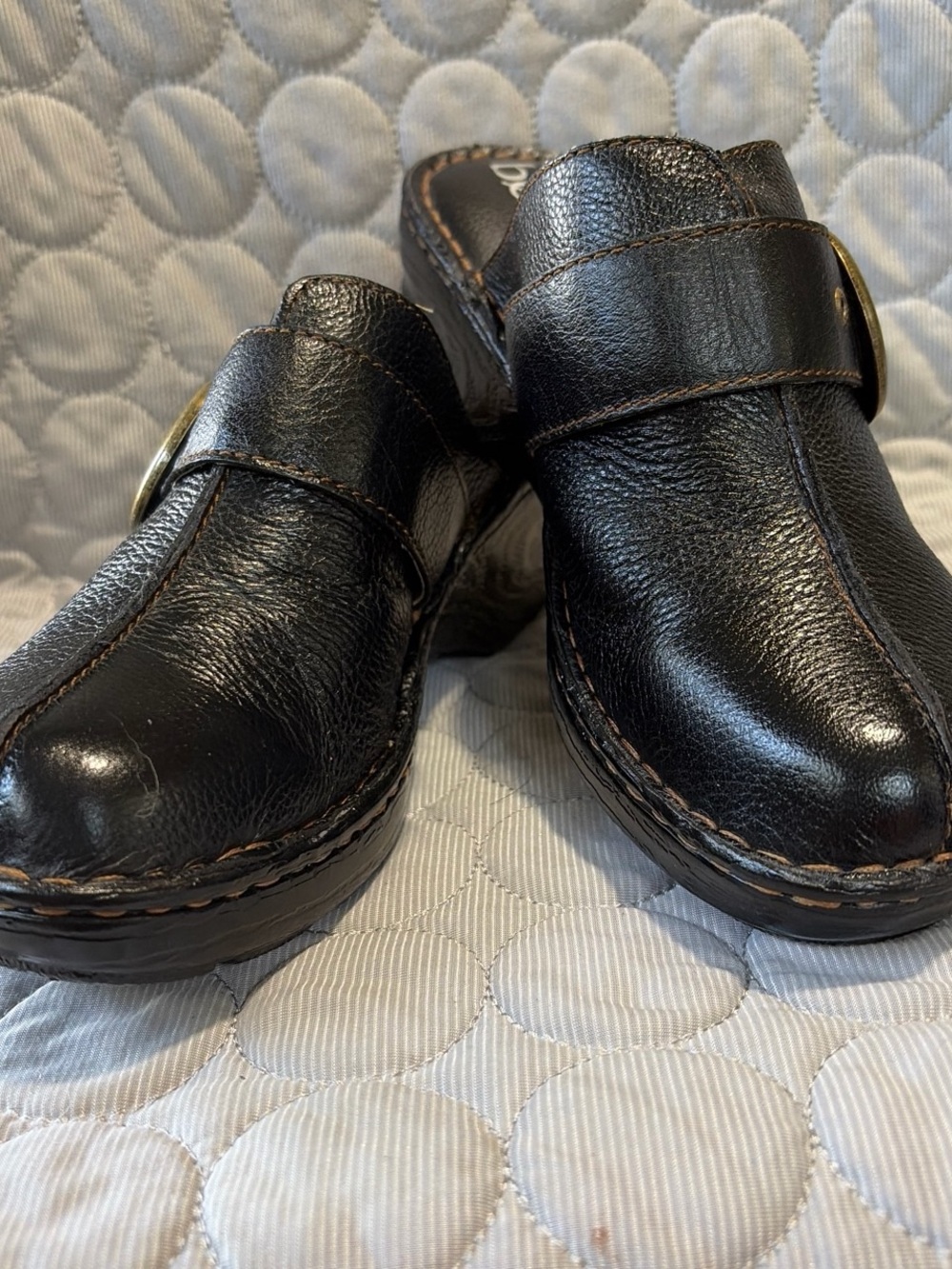 Women’s Black Leather Slip-On Clogs with Buckle Detail